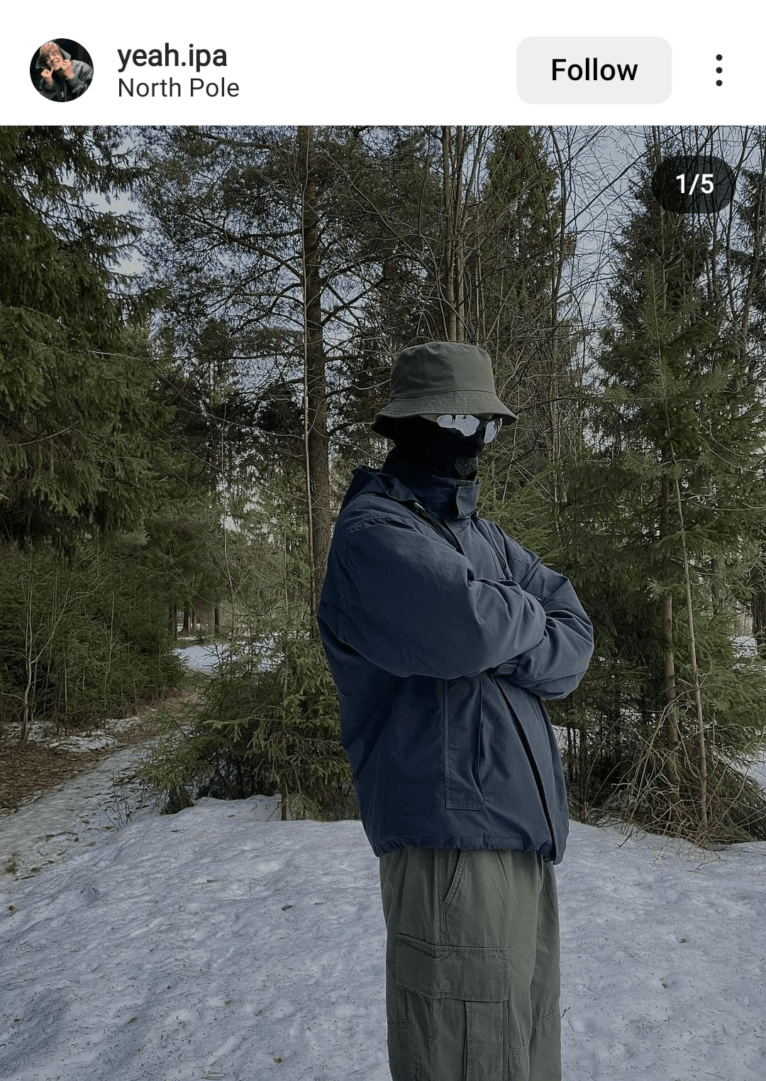 Instagram image of a person bundled up in the snow with the geotag 'North Pole'.