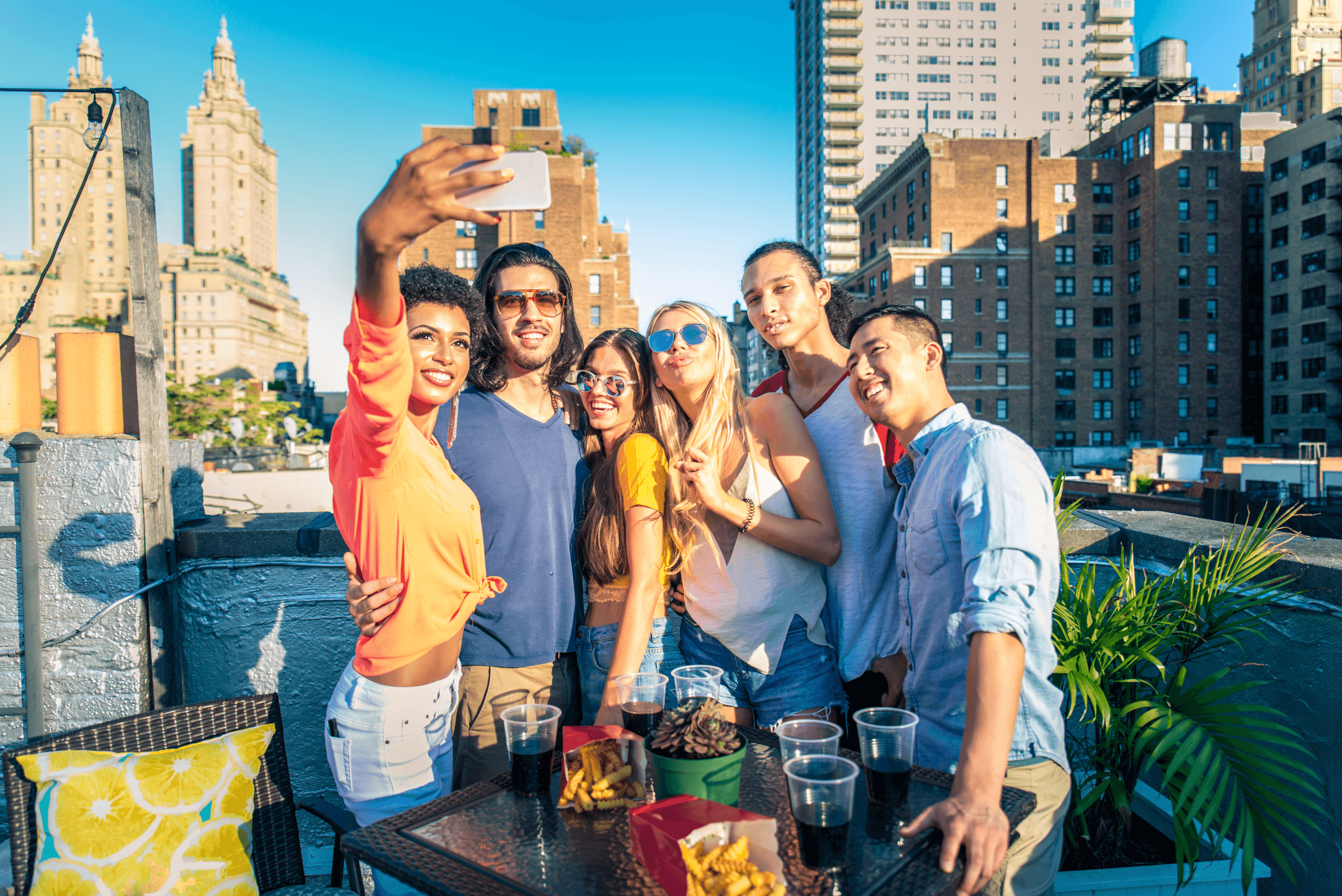 Group of friends having fun and taking a selfie in New York city